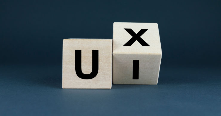 UXとUIを象徴する立方体ブロック。生成AI活用におけるユーザー体験を示す